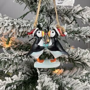Christmas Ornament-“Two Penguins Holding A Present Together”. Christmas Ornament